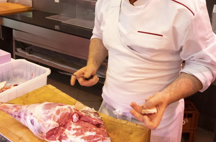 A butcher's apron with a strap